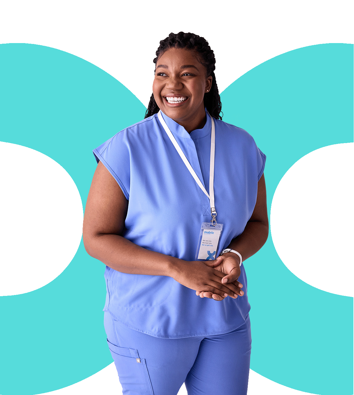smiling nurse in her blue scrubs