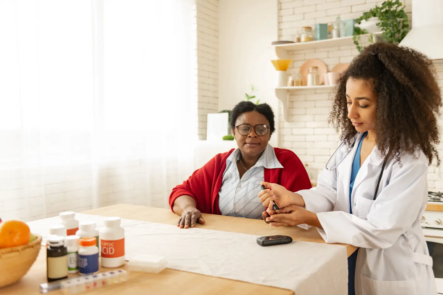 a licensed clinician performing an in-home visit to ensure continuity of care for their patient