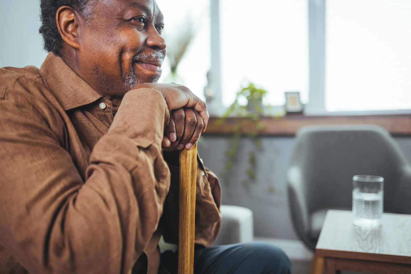 an older person whose in-home health assessments help identify potential risk factors in the home
