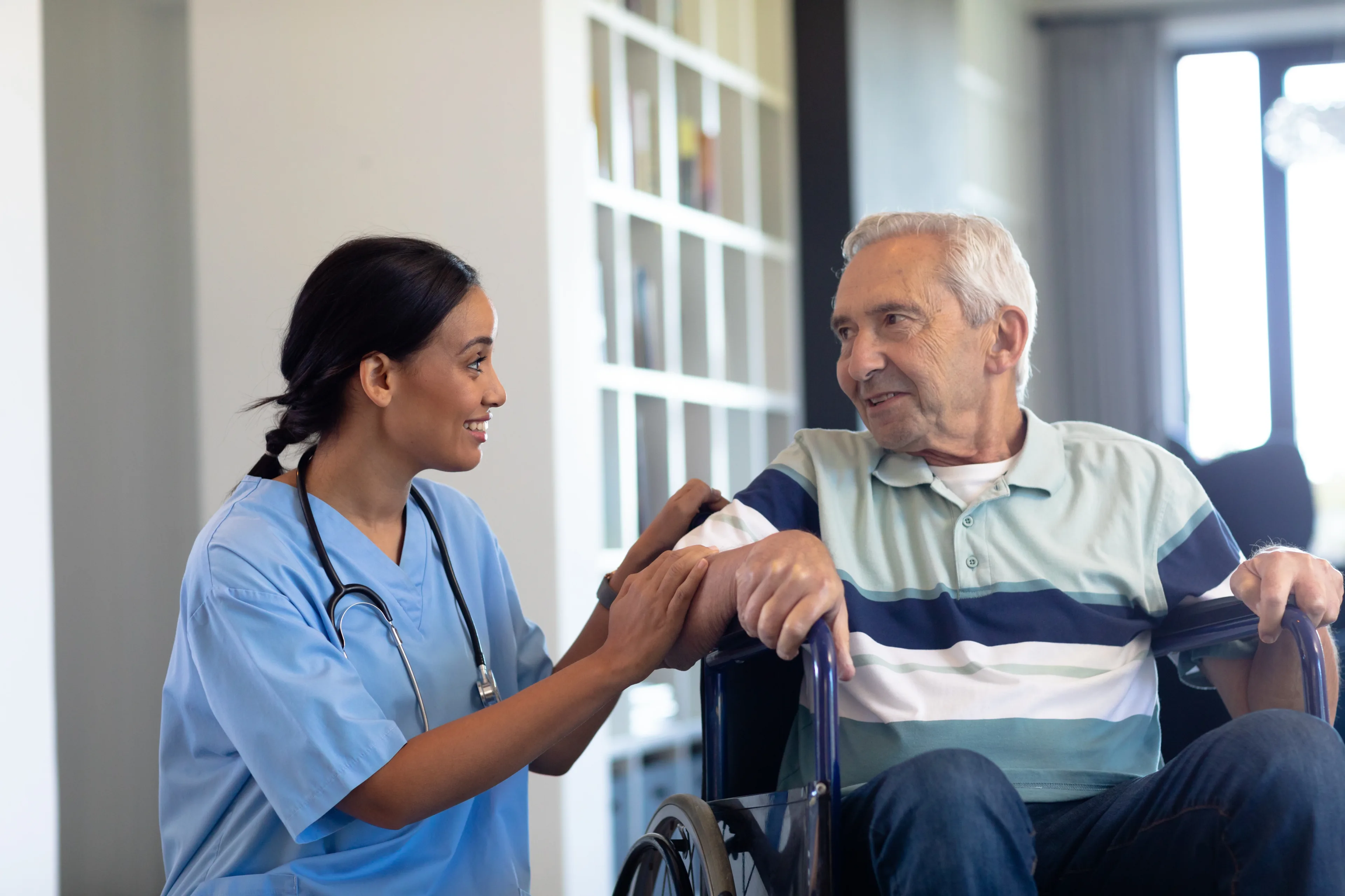 a licensed clinician helping to improve the physical health of a patient by integrating mental wellness screenings into a home visit