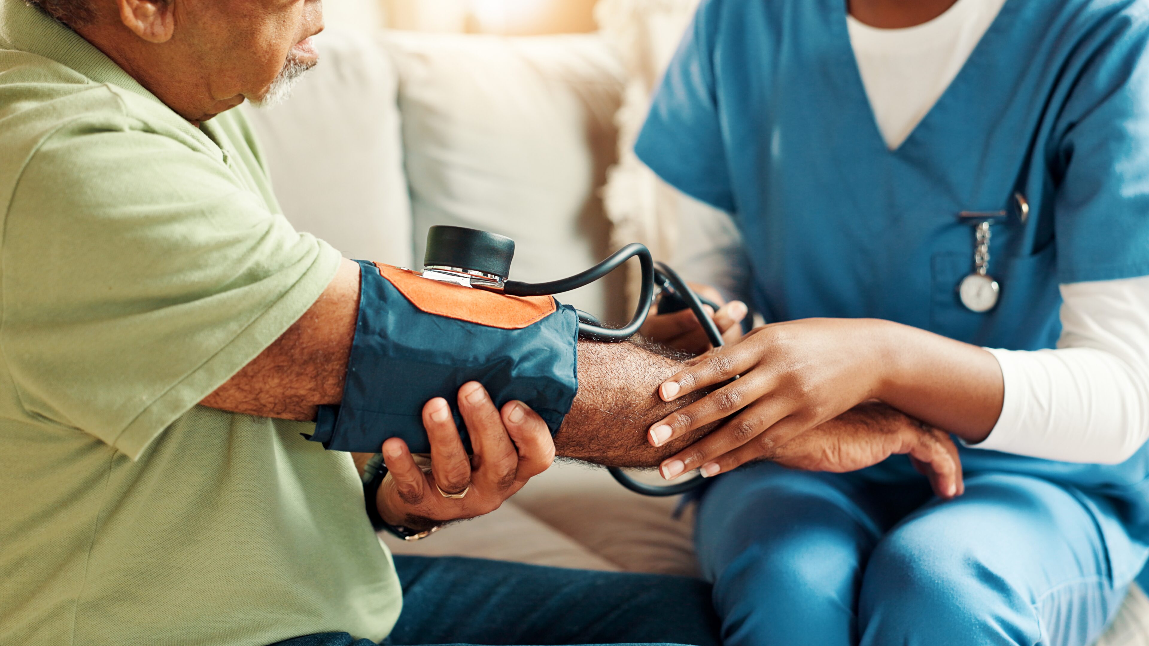 nurse completing in-home comprehensive health assessment